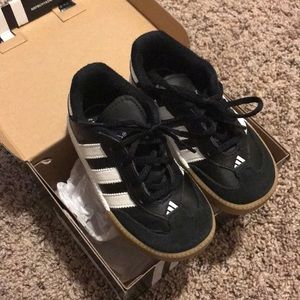Black and white toddler adidas.